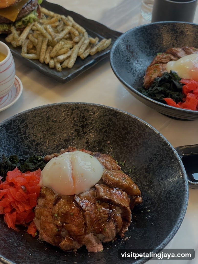 Japanese-style food bowls with fried rice and sides
