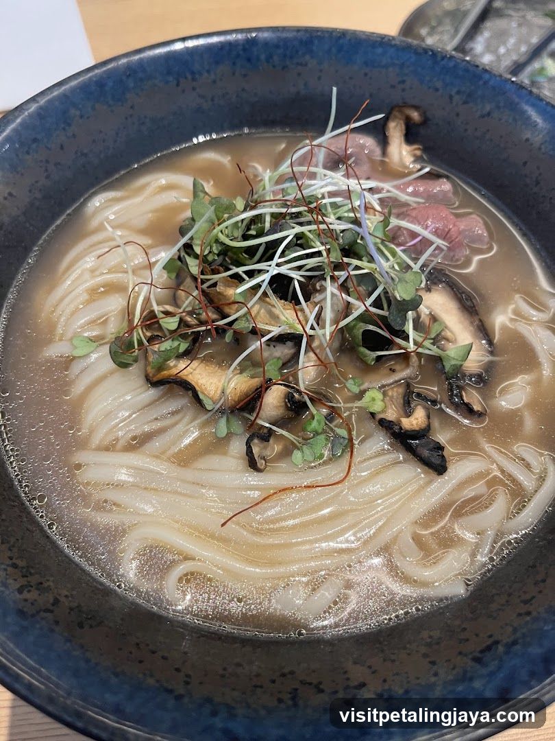 Bowl of Noodles with Mushrooms and Greens