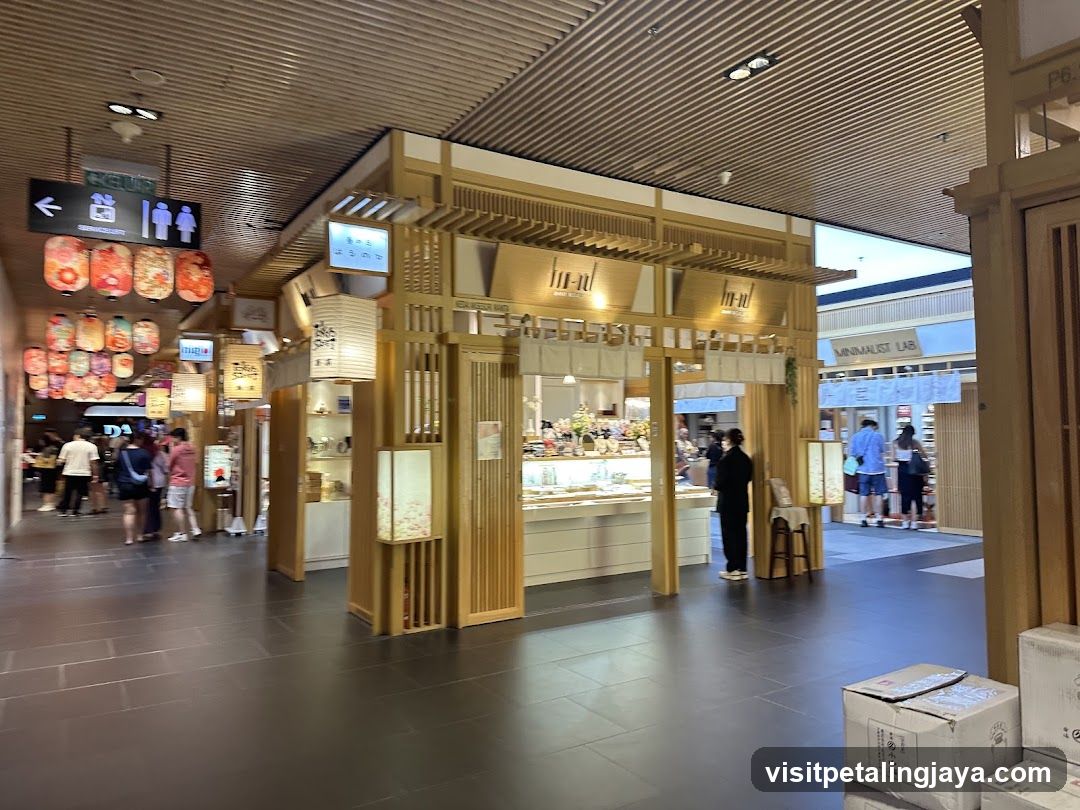 Shopping Mall Interior with Food Stalls and Decorative Lanterns