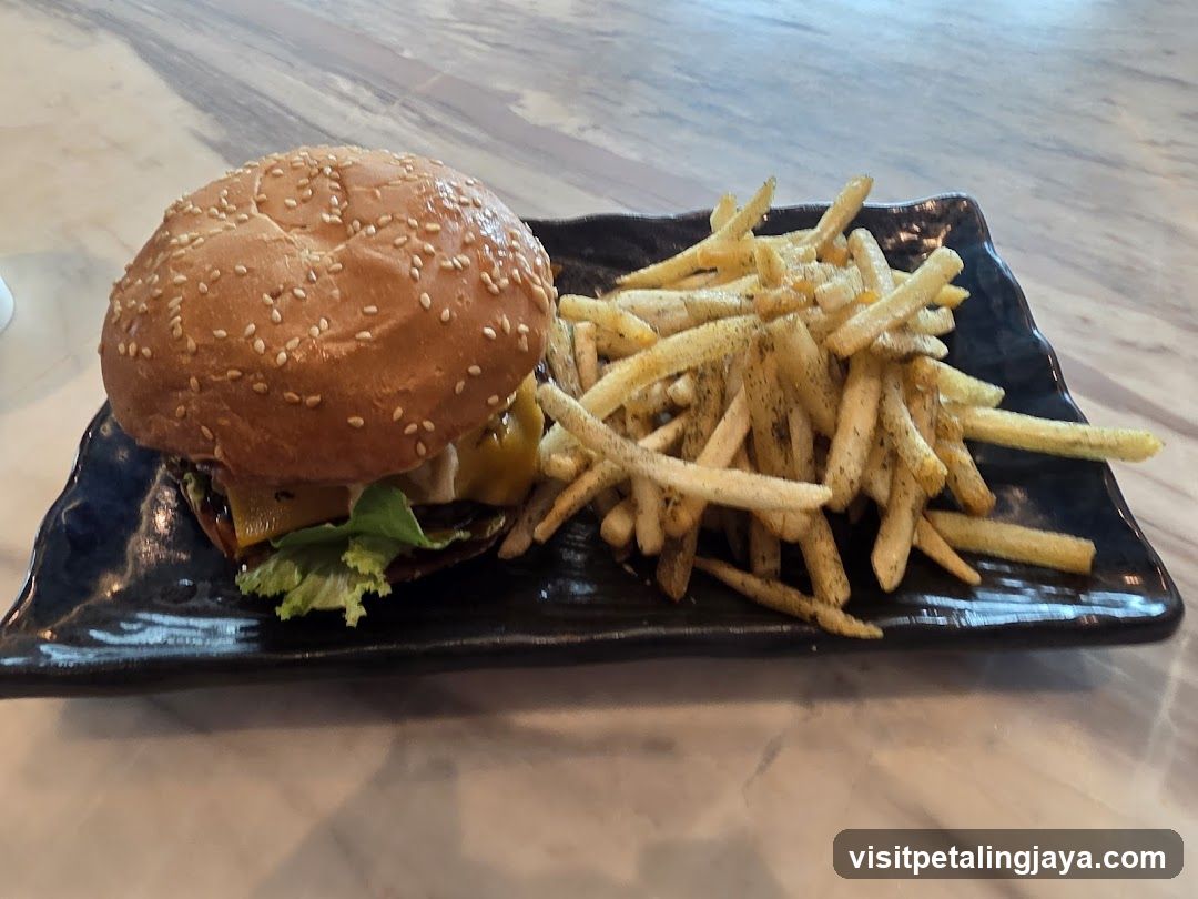 Burger and Fries on Black Plate