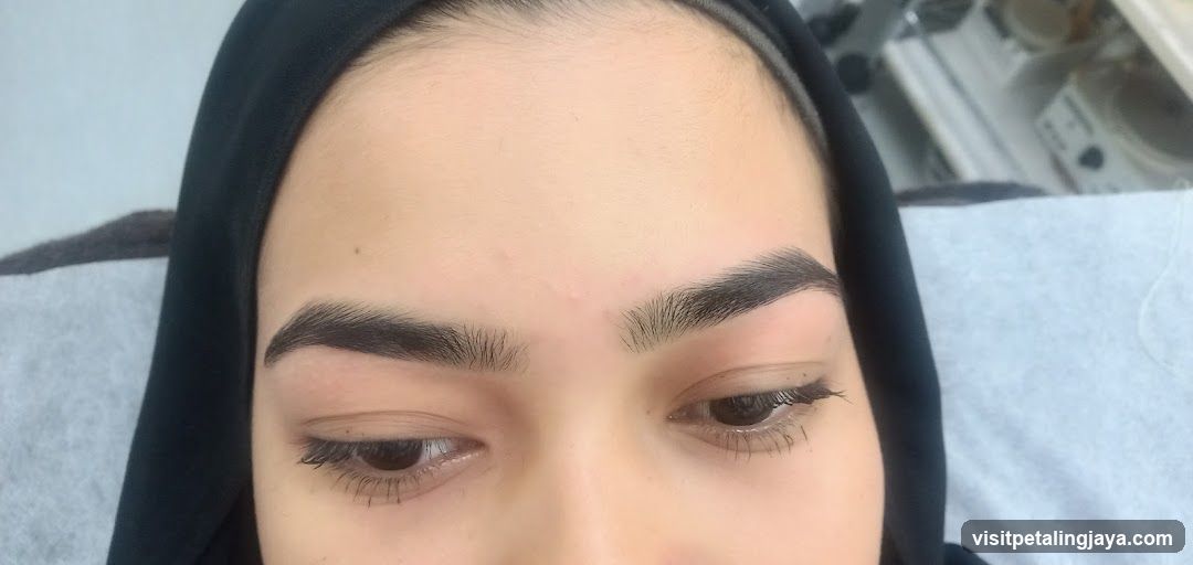 Close-up of a person's face with hijab