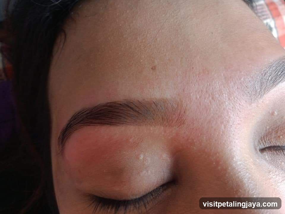 Close-up of a person's face with closed eyes