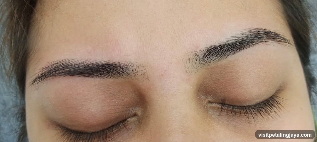 Eyes with closed lids and eyebrows