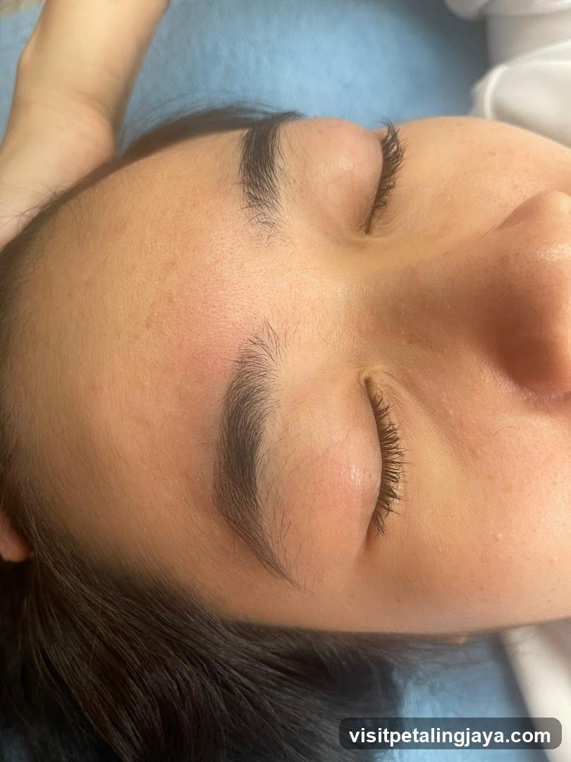 Close-up of a person's face with closed eyes