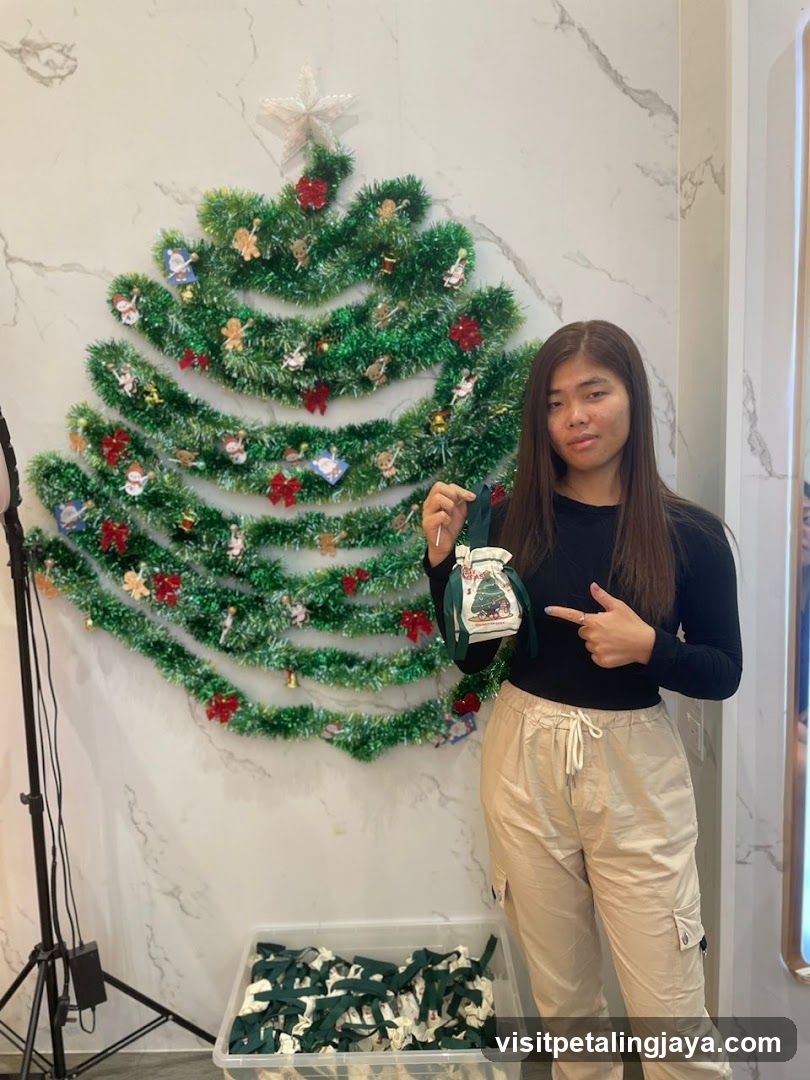 Christmas Decor Display with Staff Member