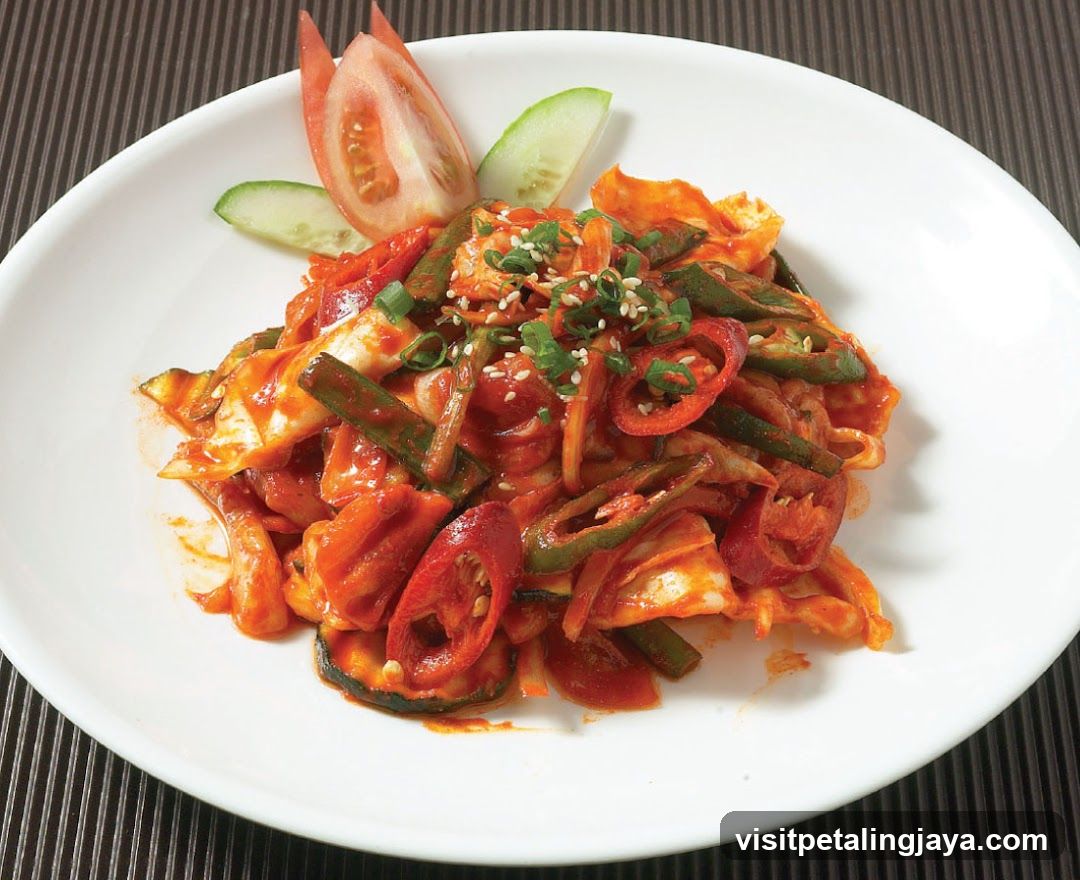 Spicy Vegetable Salad with Tomato and Cucumber Garnish