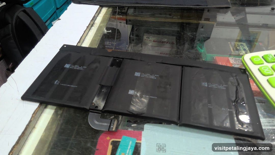 Laptop Battery on Glass Counter