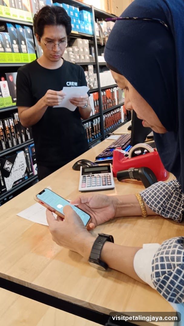 Store Interior with Staff and Customer