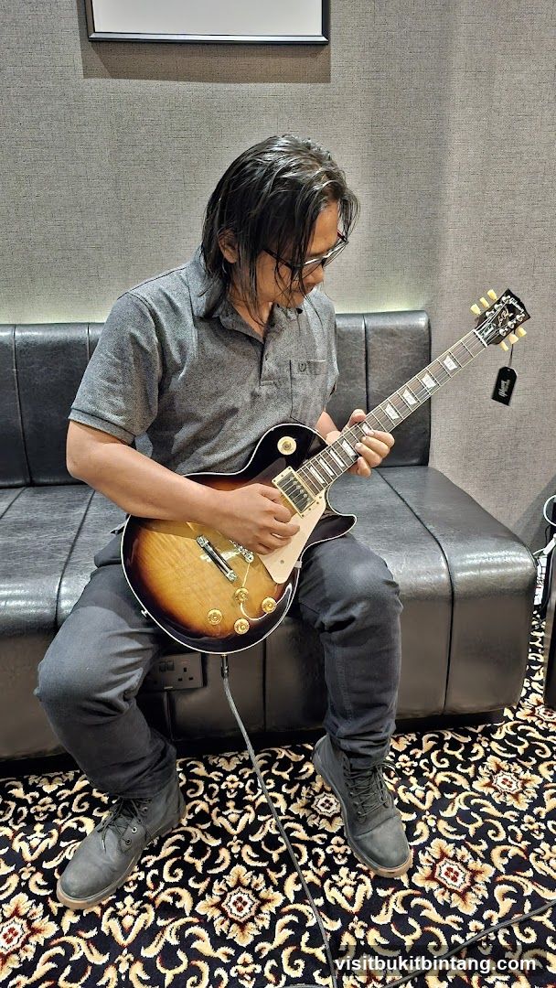 Man playing a guitar