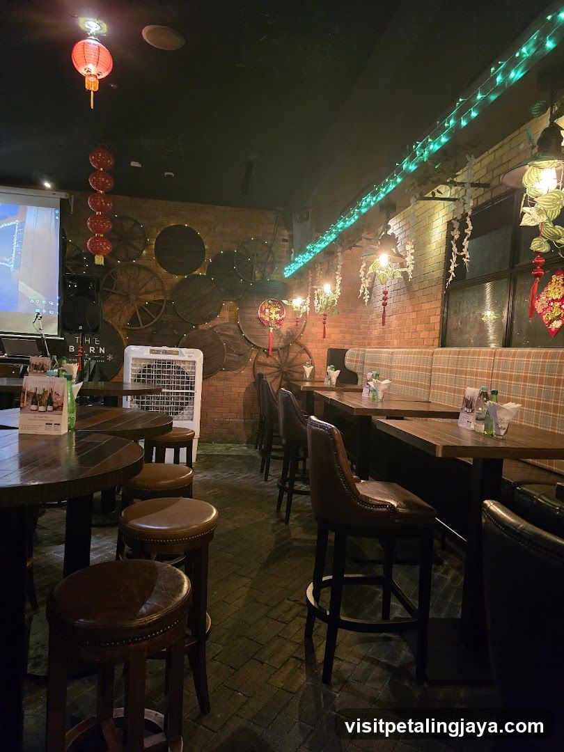 Interior of a bar or restaurant with brick walls and festive decorations.