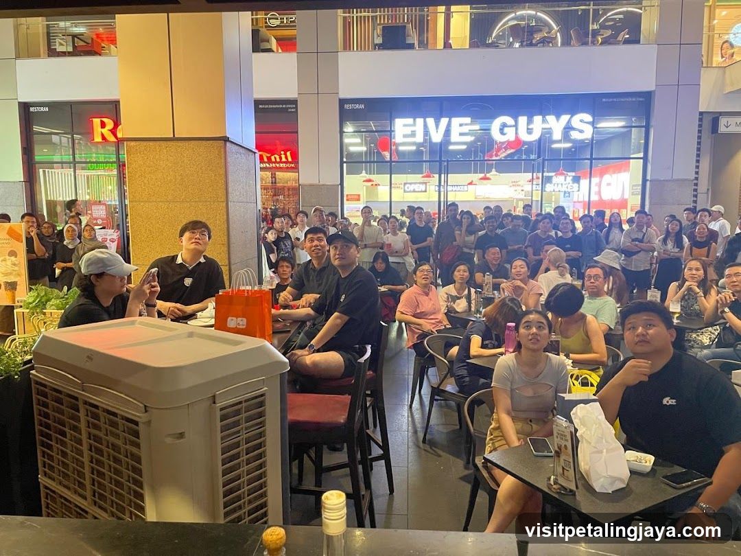 Crowded Restaurant Interior with Shop Front in Background