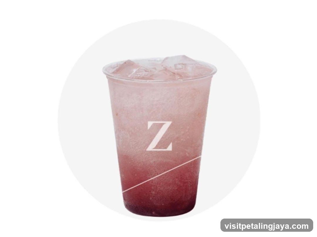 Pink Iced Drink with Ice Cubes