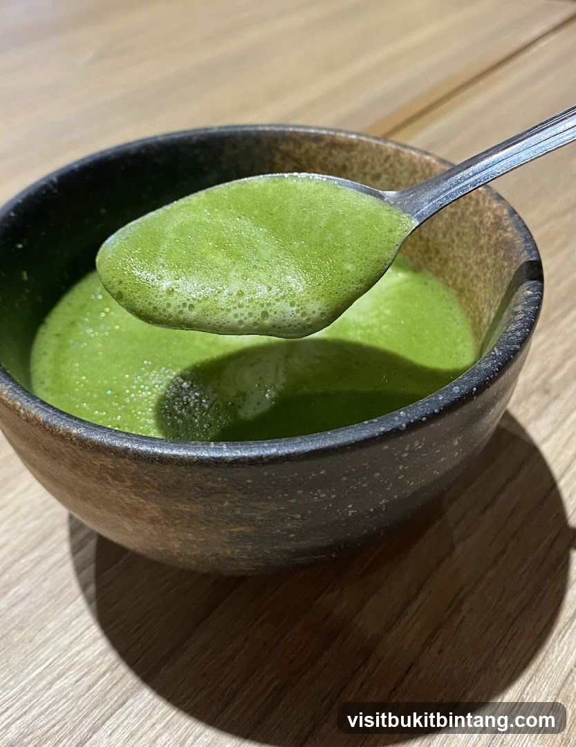 Green Soup on Spoon