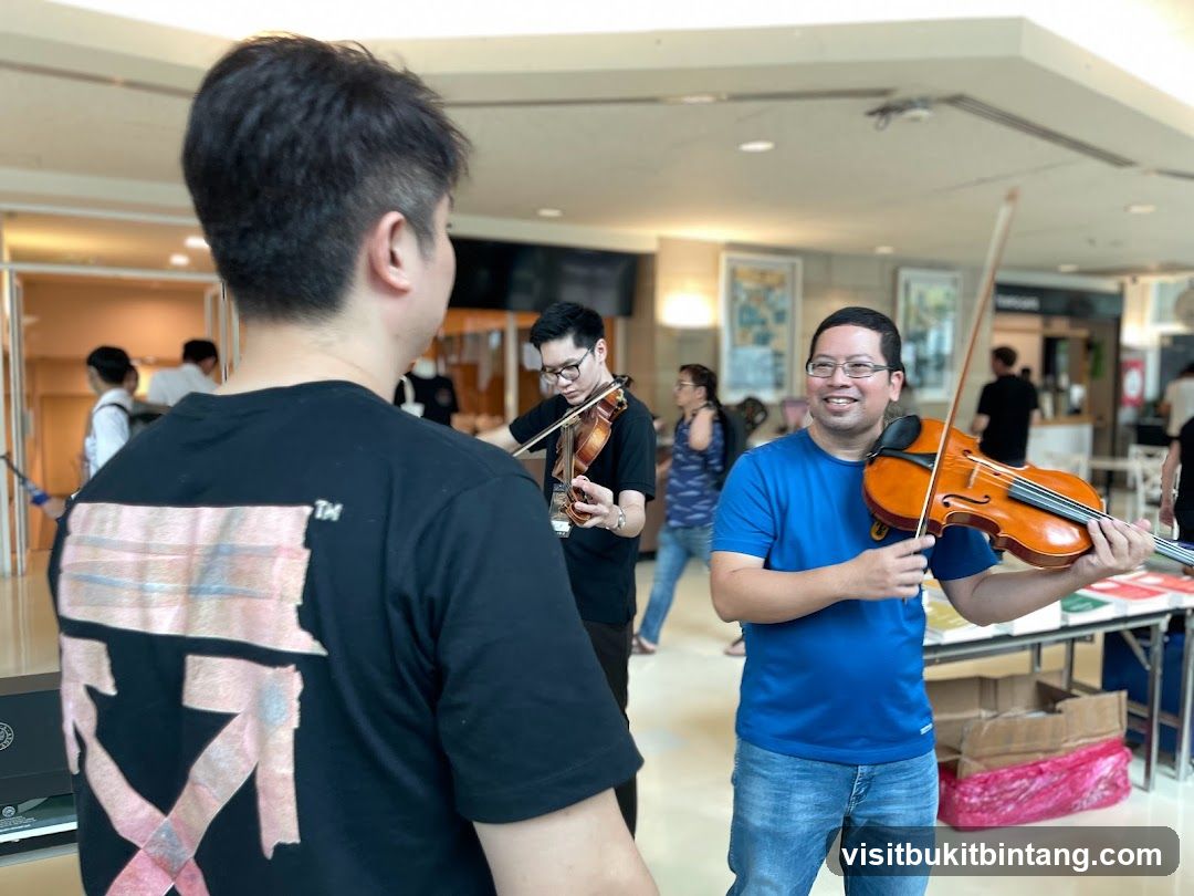 Musicians playing violins