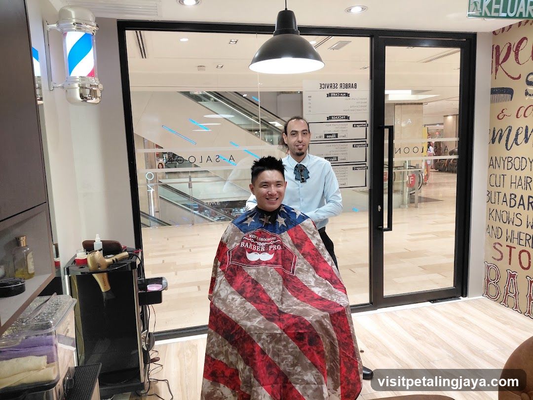 Barber Shop Interior with Customer and Barber