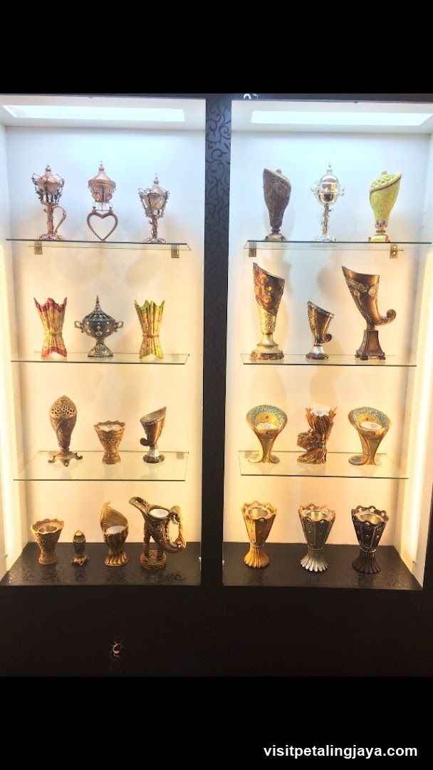 Display of ornate vases and cups