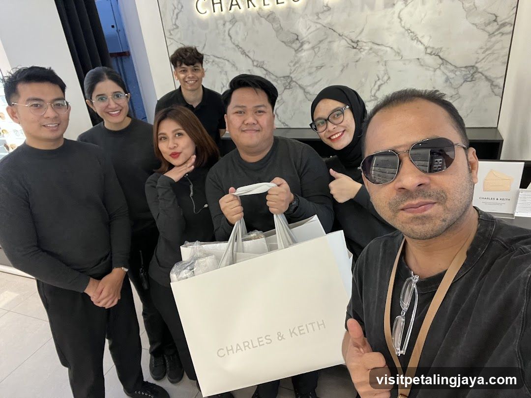 Group with shopping bags at Charles & Keith store