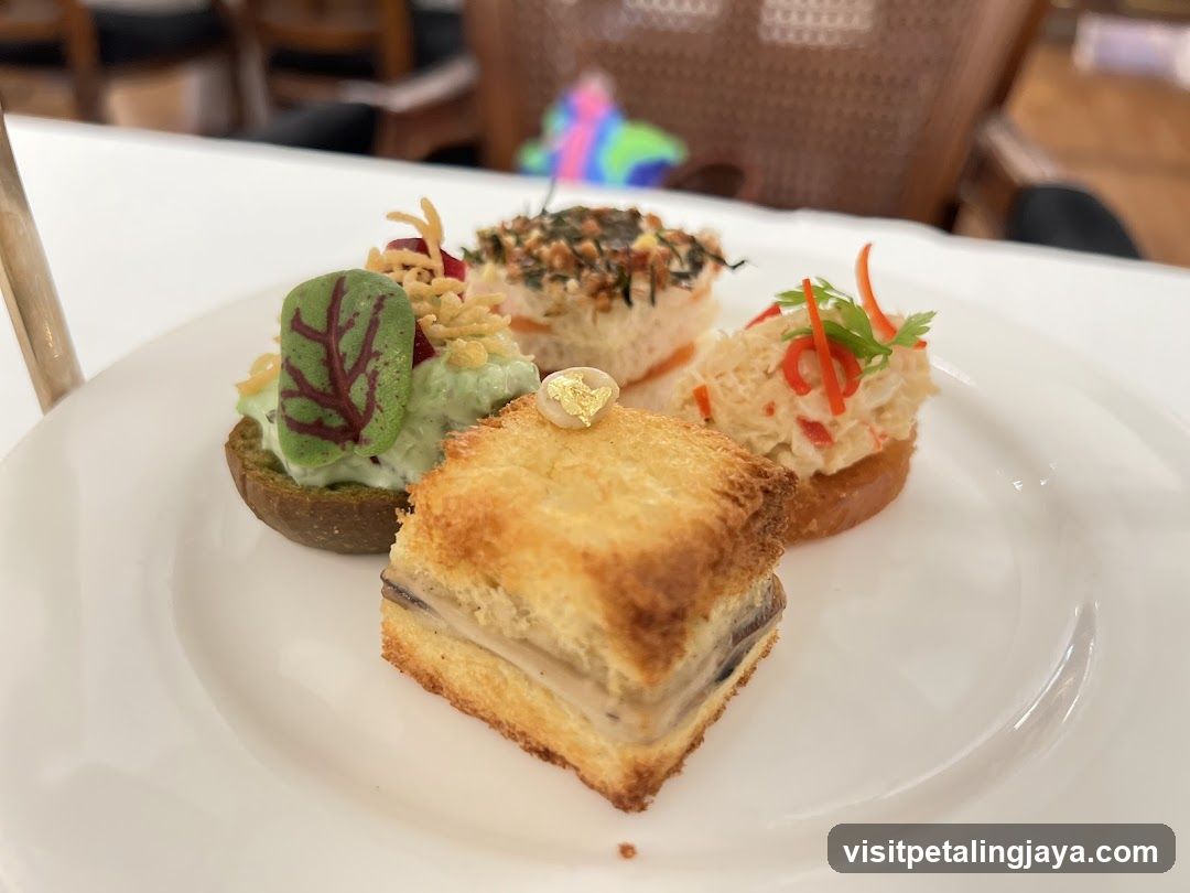 Assorted Canapés on White Plate