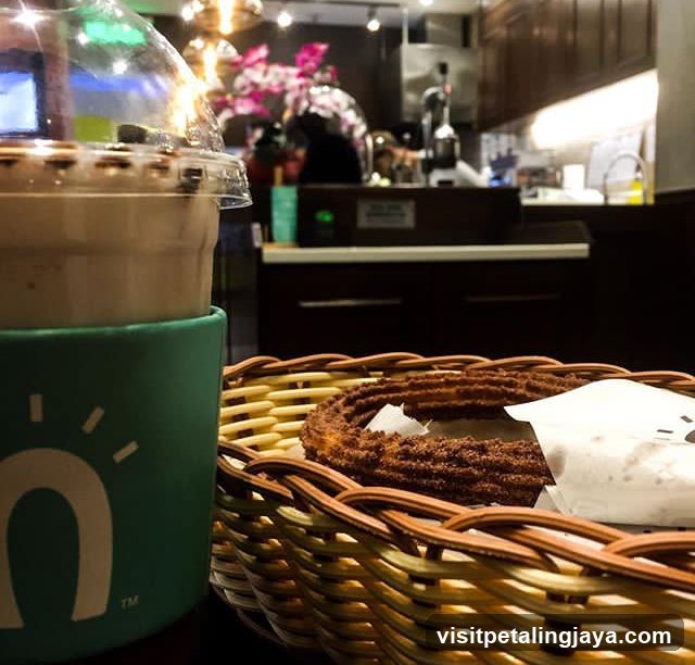 Coffee and Churros in a Cafe