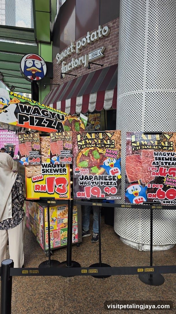 Food Stall Display with Signage and Posters