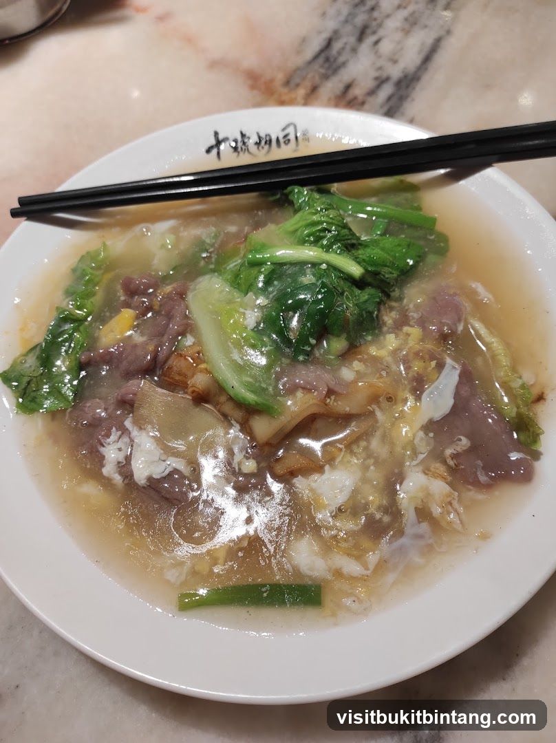 Beef noodle soup with vegetables