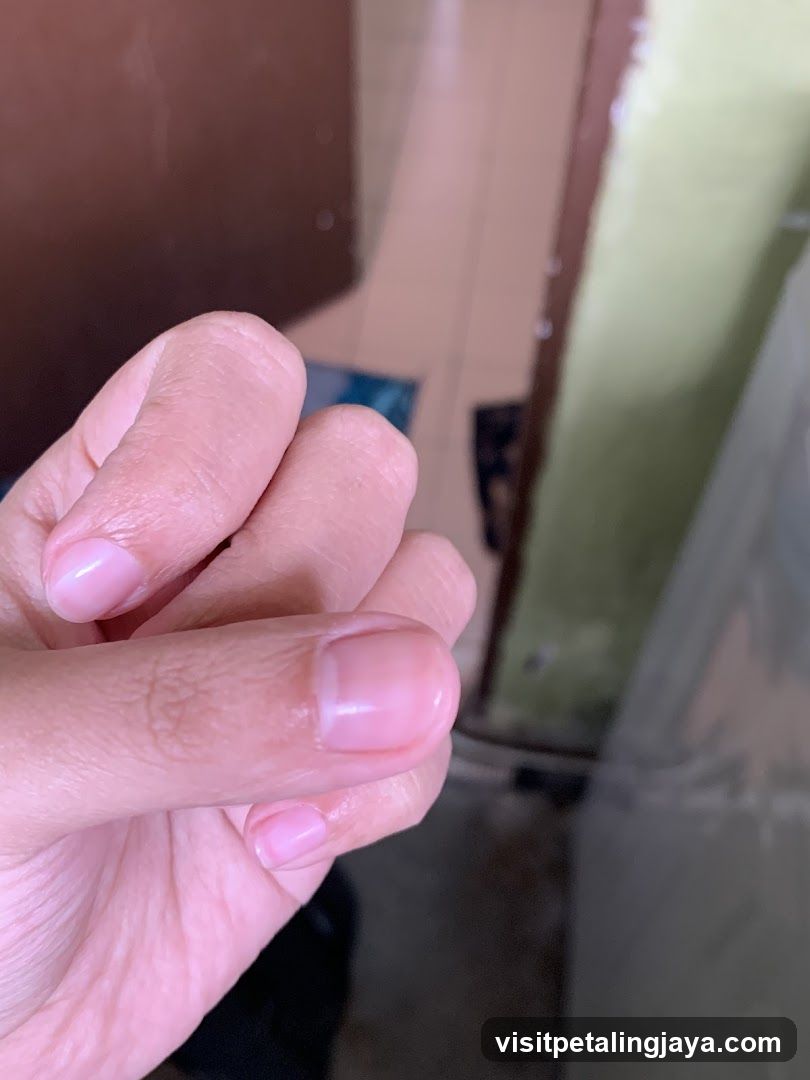 Hand with fingers curled
