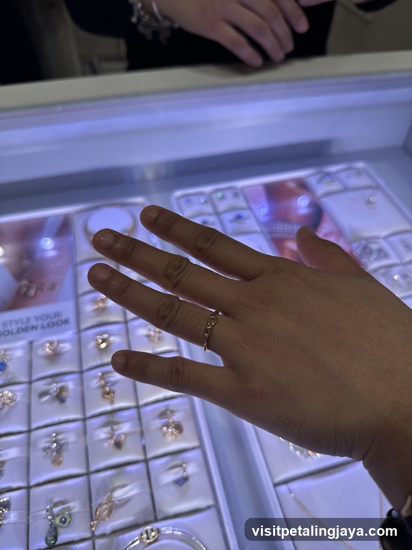 Jewelry Display Case with Ring on Finger