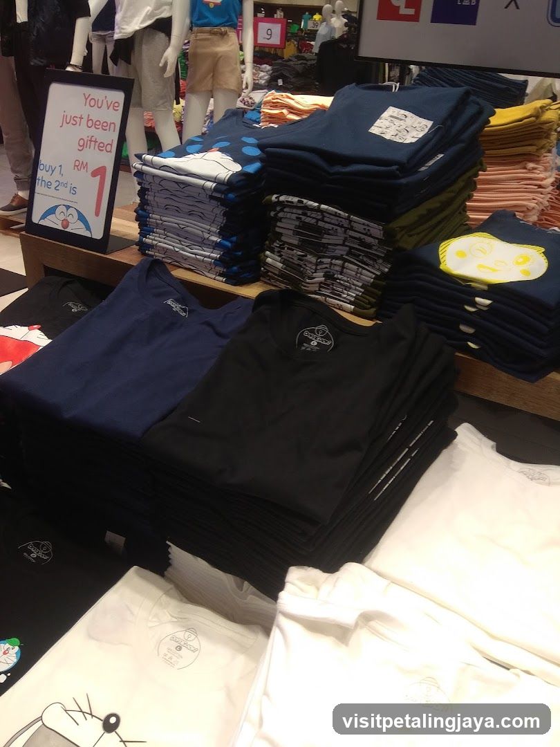 T-shirt Display with Discount Sign