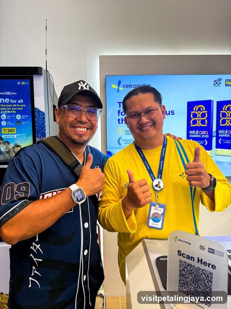 Two men giving thumbs up at a store