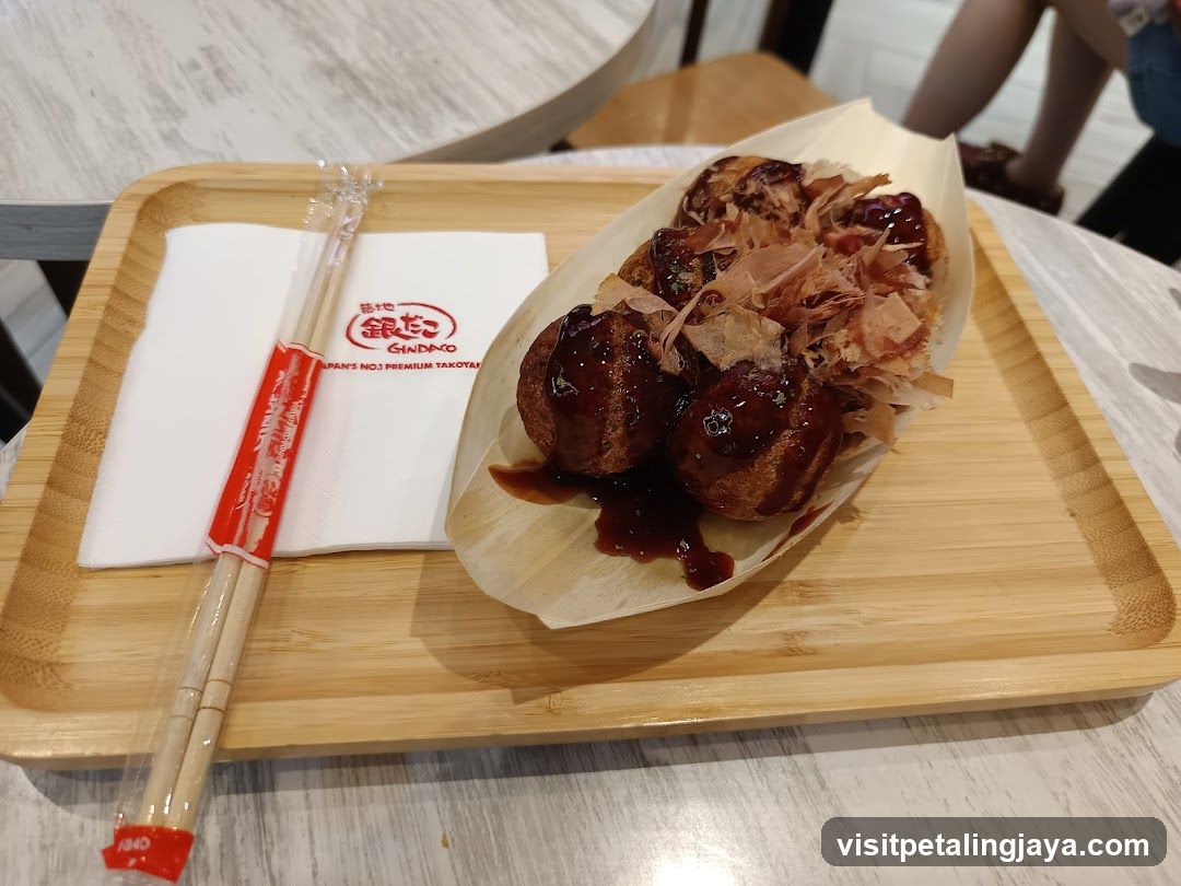 Takoyaki on a wooden tray