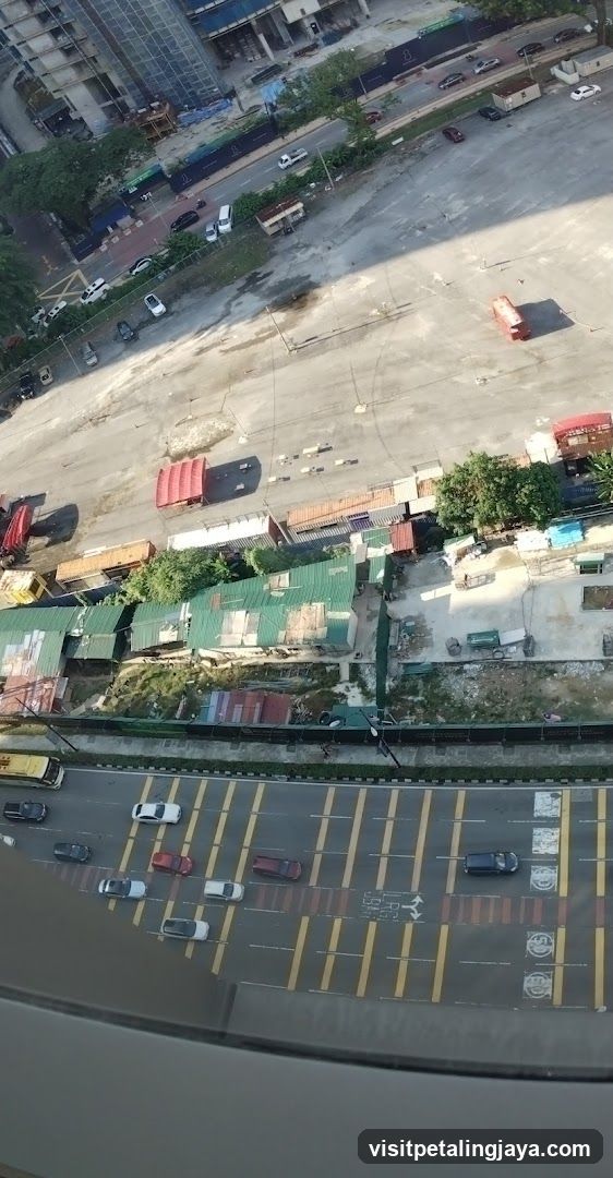 Aerial View of Urban Street and Parking Area