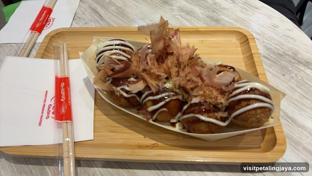 Takoyaki on a wooden tray