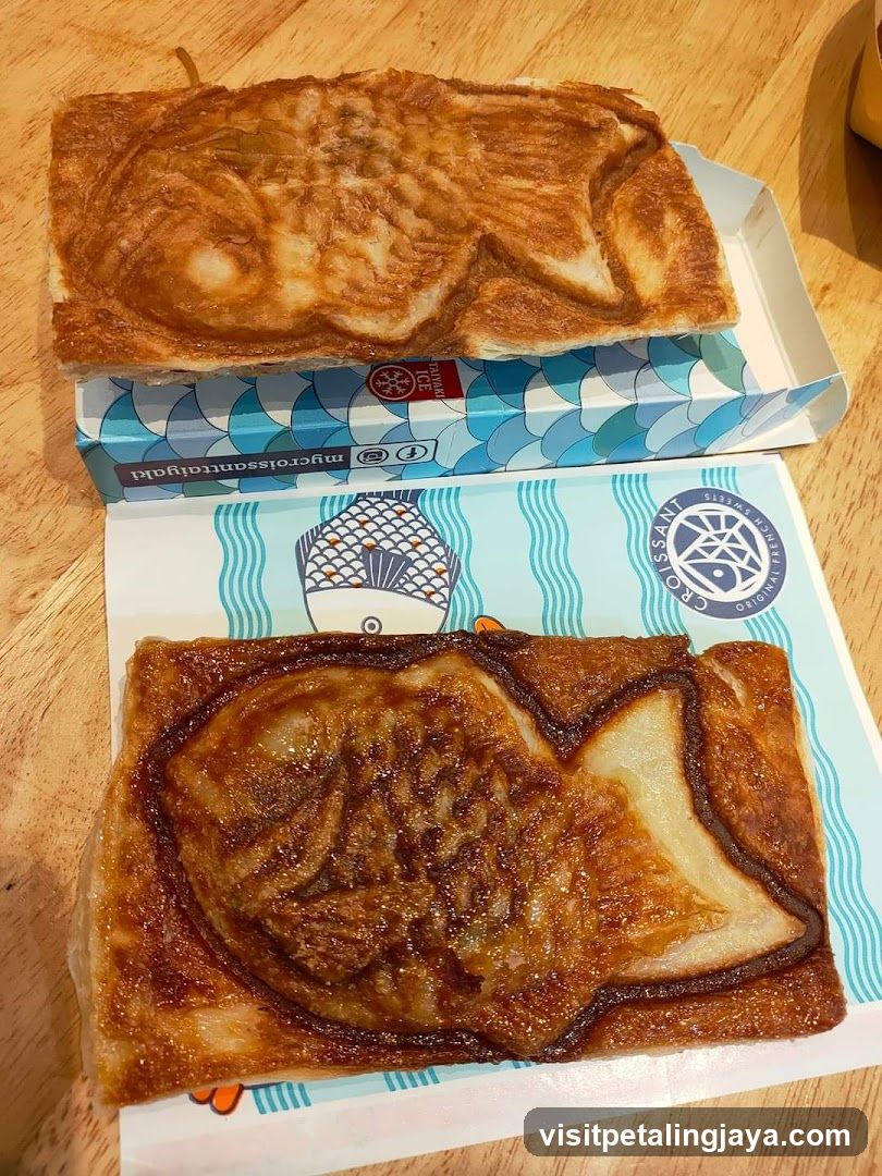Fish-shaped pastry on branded packaging