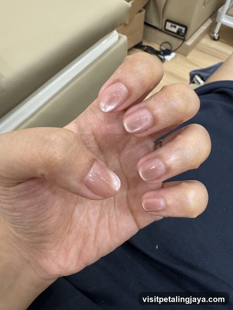 Hand with manicured nails