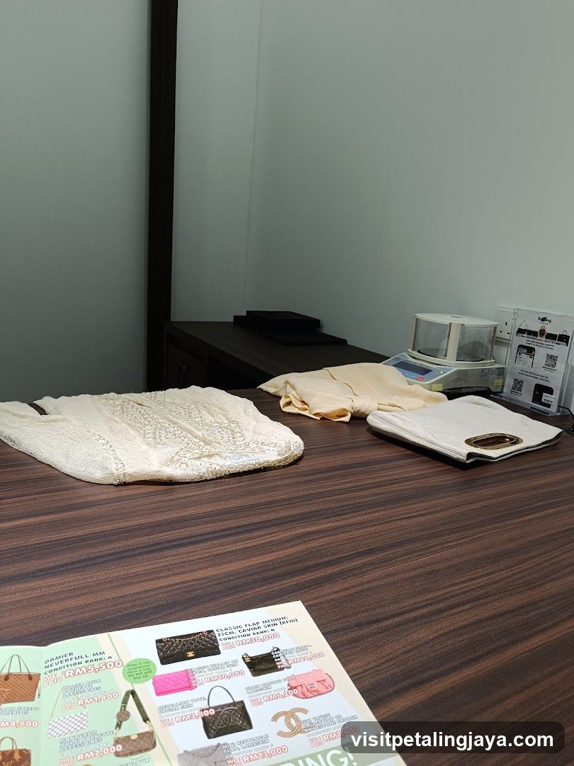 Interior display table with fashion items and catalog