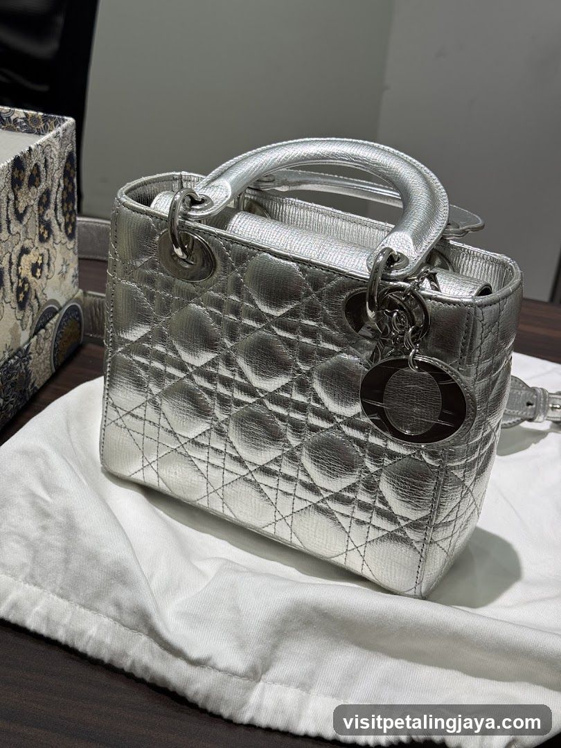 Silver Handbag on White Cloth