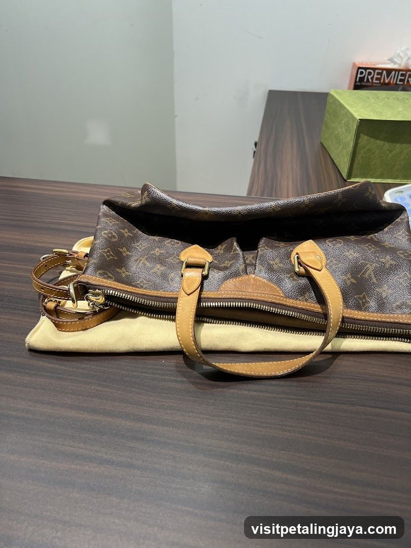Louis Vuitton Handbag on Table