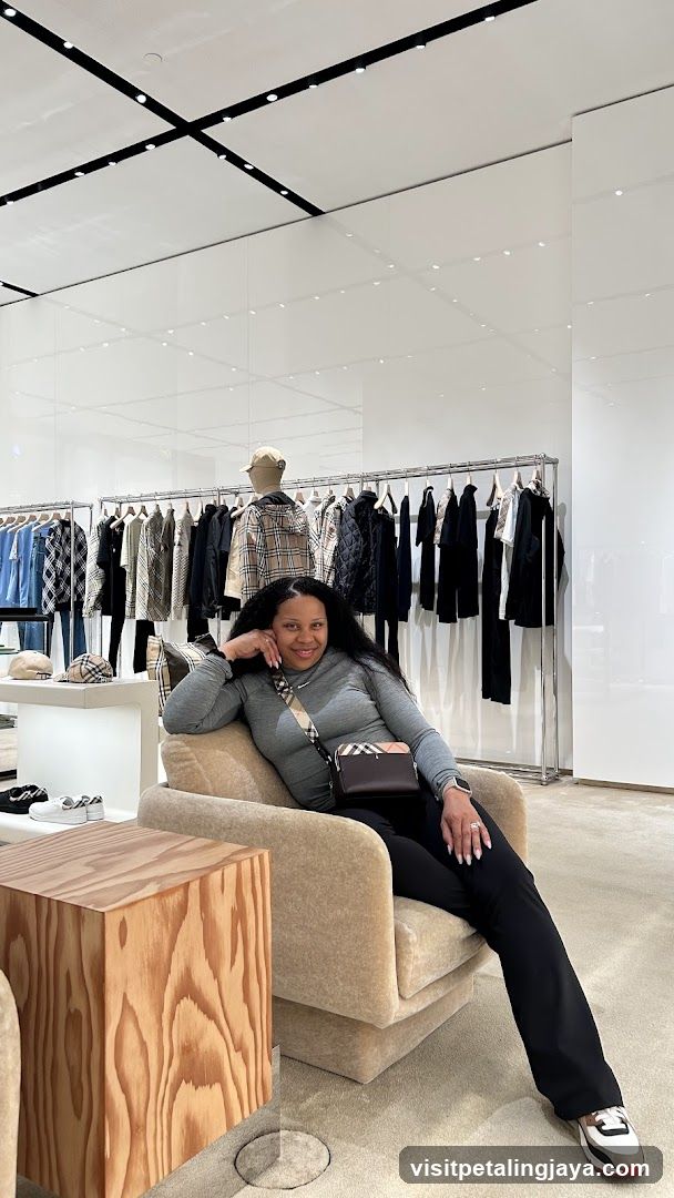 Woman in a clothing store interior