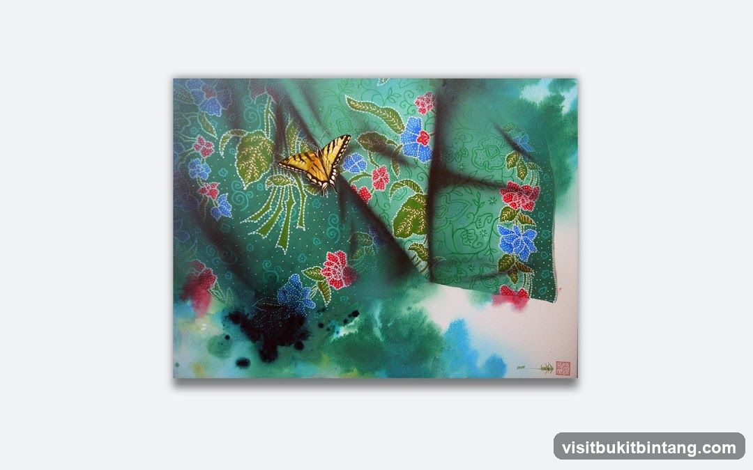 Painting of a butterfly on green fabric