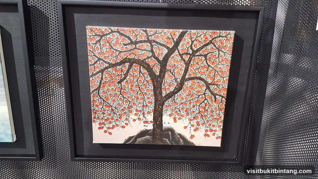 Painting of a tree with orange fruits