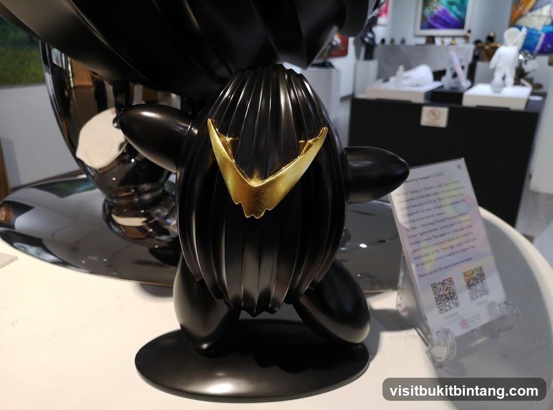 Black Sculpture with Gold Accent