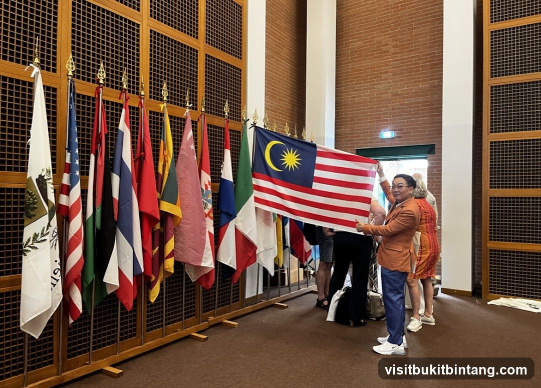 People Holding Malaysian Flag Among Other National Flags