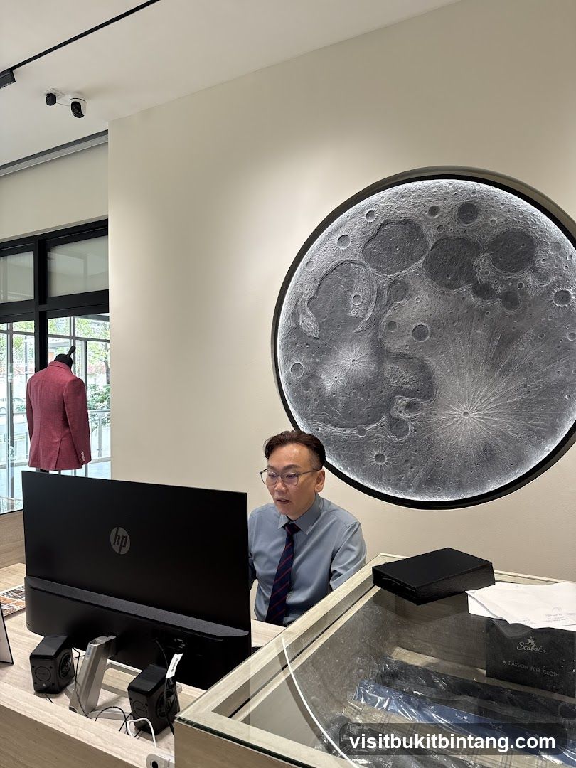 Man working at a desk in a store