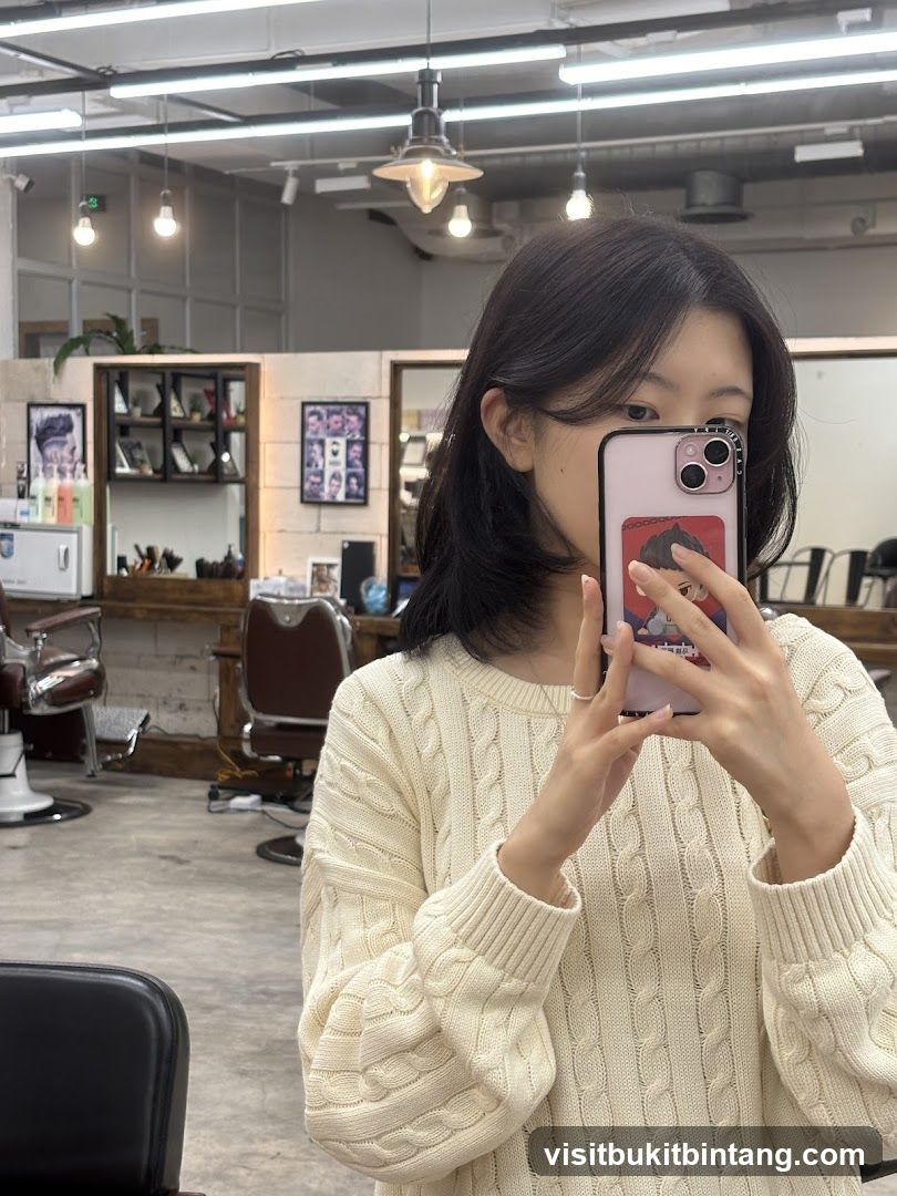 Woman taking a selfie in a salon