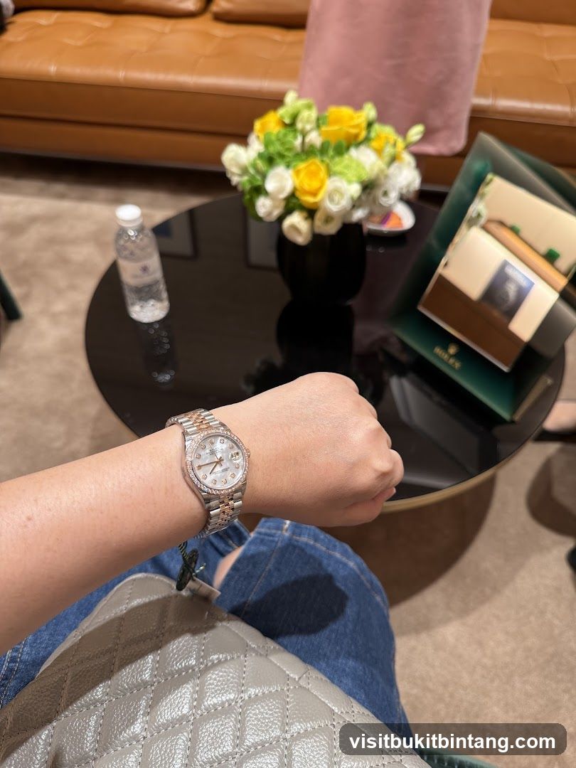 Woman wearing a Rolex watch
