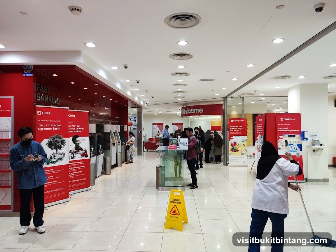 Bank Interior with ATMs and Customers