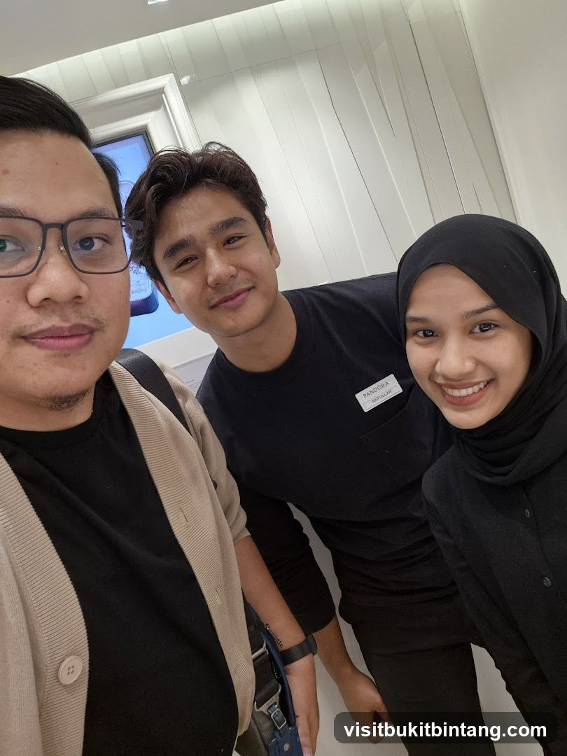 Three people smiling for a selfie