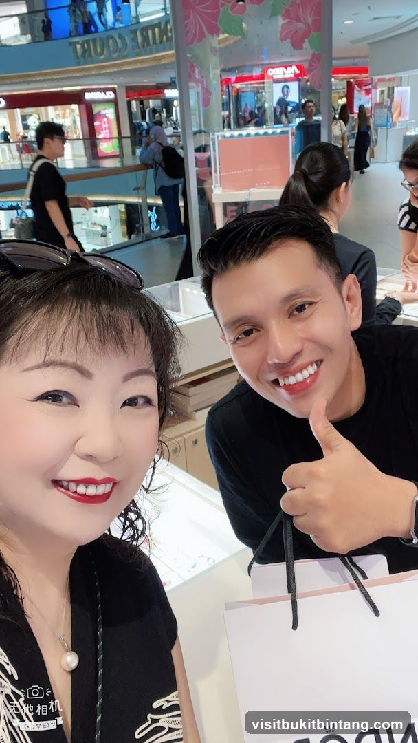Two people smiling in a store