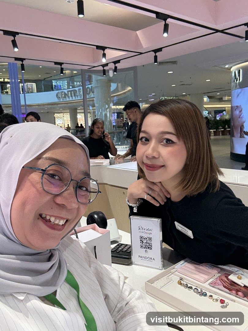 Two women smiling in a jewelry store