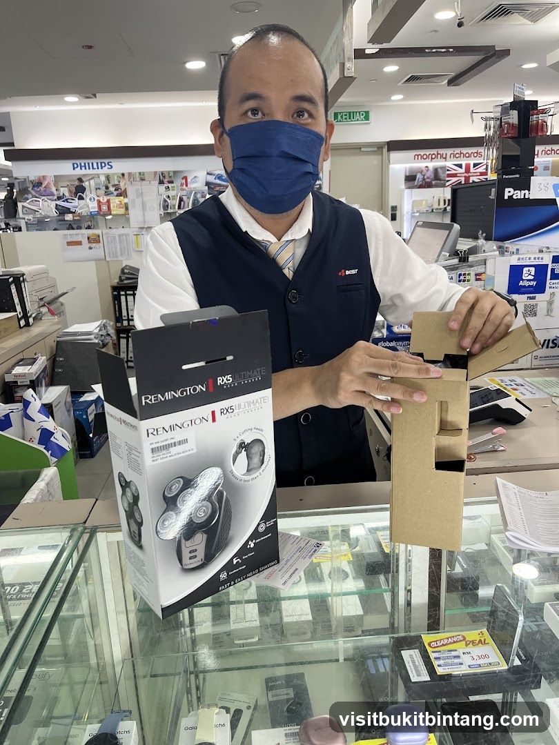 Salesperson with Remington shaver box